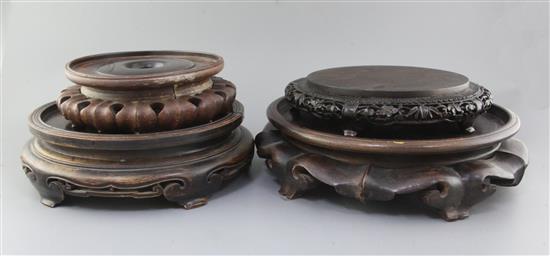 Four Chinese large hardwood stands, late 19th/early 20th century, width 23.5cm - 36.5cm
